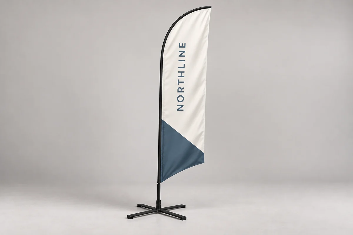 Northline flag banners photographed on a soft neutral studio background